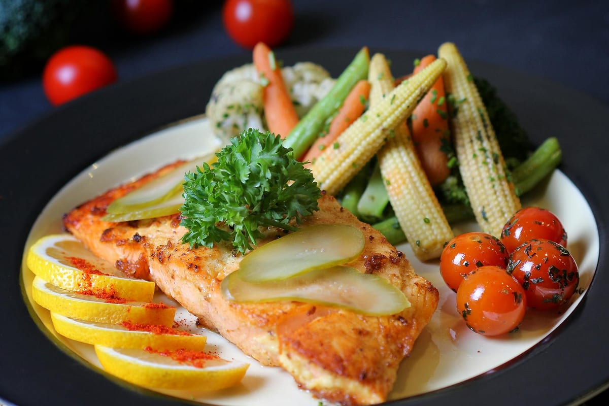 grilled salmon fillet with lemon and herbs