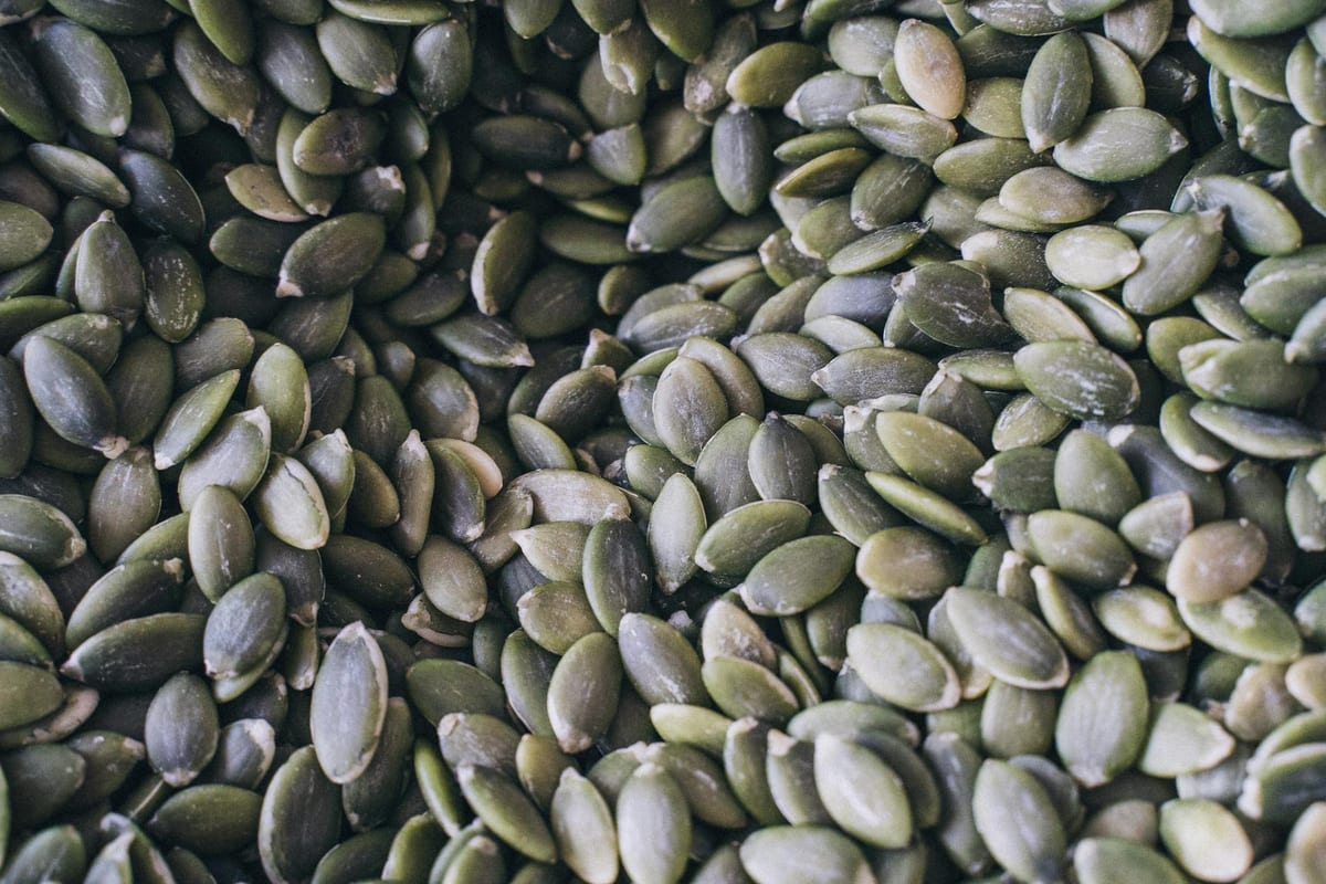 pumpkin seeds nuts and leafy greens magnesium foods