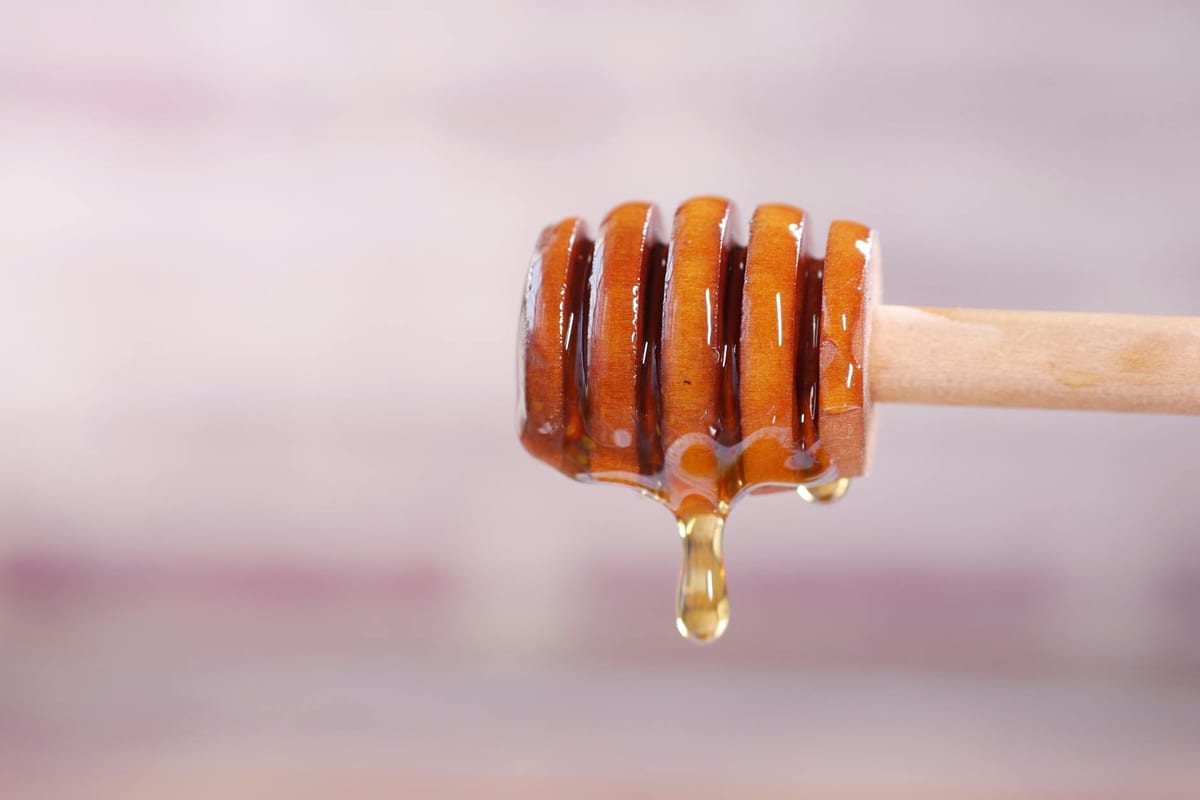 Raw honeycomb with golden honey